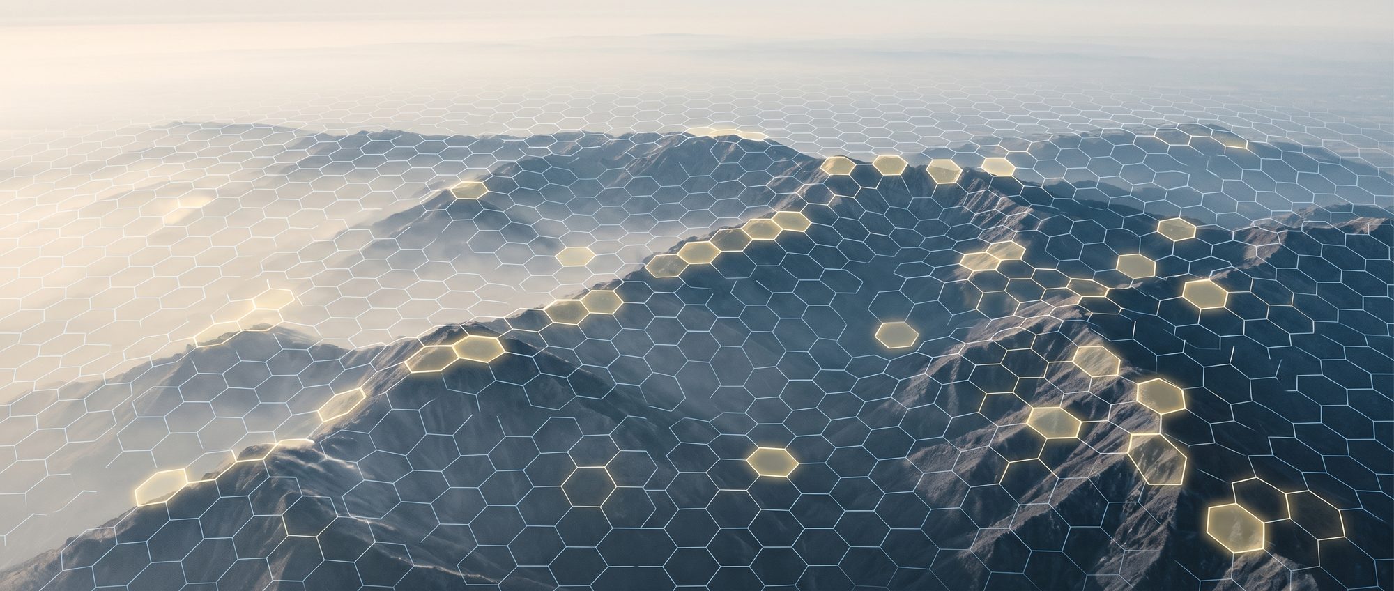 Aerial view of a mountain range under a hexagonal survey grid with scattered cells lit gold
